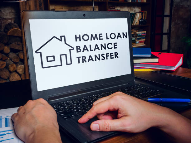 istock Home loan balance transfer info on laptop screen. 1295937891