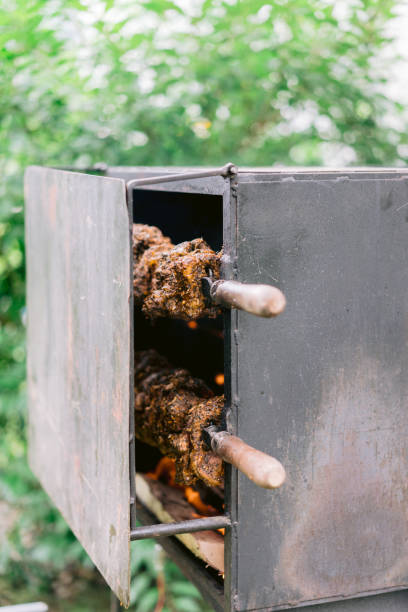 istock Pork on a rotisserie 1295937982