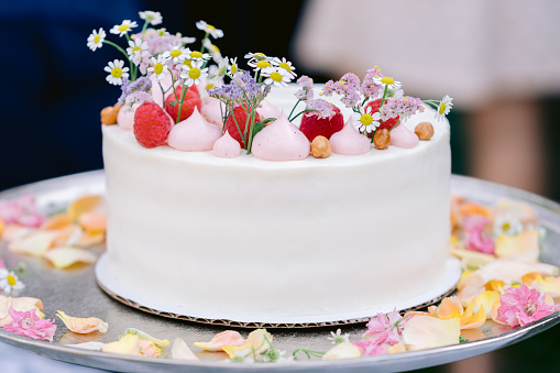 Wedding or Birthday Cake with Flowers and rasberrys in white and pink