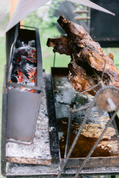 istock Whole pig on a rotisserie 1295938114