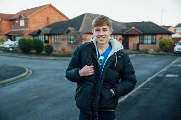 First Day of College! A front-view waist-up portrait shot of a caucasian teenage boy, he is smiling and looking at the camera, ready for his first day of college. hartlepool photos stock pictures, royalty-free photos & images