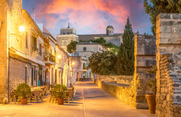 Landscape with Alcudia Old Town Landscape with Alcudia Old Town in Palma de Mallorca islands, Spain bay of alcudia stock pictures, royalty-free photos & images