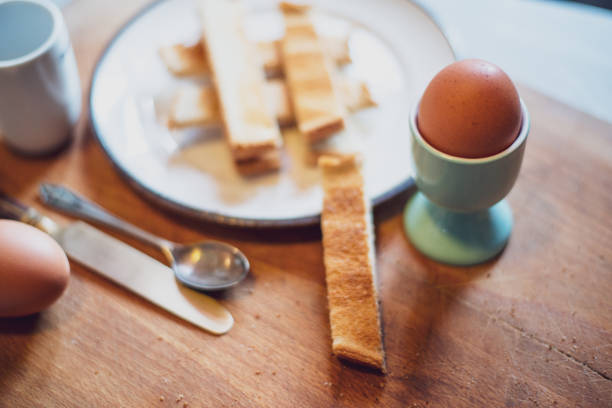 istock soft boiled egg in egg cup with toasted bread soldiers,shallow depth of field. 1295944195