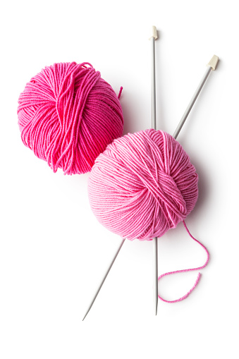 Balls of Wool and Knitting Needles Isolated on White Background. More knitting photos can be found in my portfolio! Please have a look.