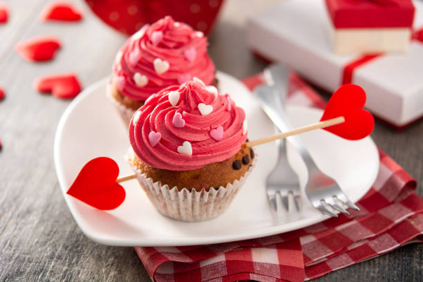 istock Cupcakes decorated with sugar hearts for Valentine's Day 1295946508