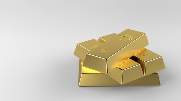 istock Gold coins with gold ingot and white background. 1295946537