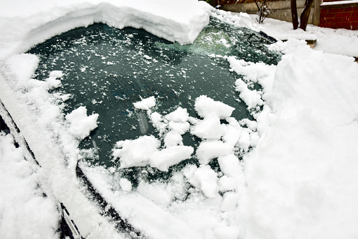 Close up of car in snow drift