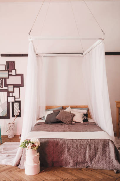 istock bedroom with a four-poster bed 1295949067