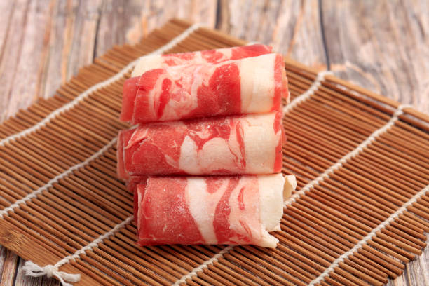 fresh mutton for hot pot, chinese food, Fresh mutton was rolled up on a plate Mutton rolls, fresh mutton for hot pot, chinese food, Fresh mutton was rolled up on a plate mutton roll for chinese hot pot stock pictures, royalty-free photos & images