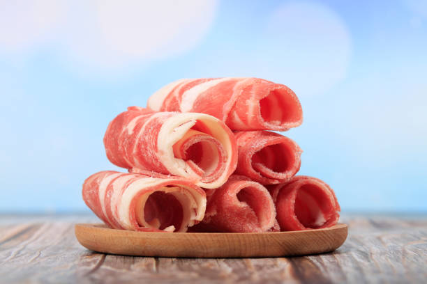 fresh mutton for hot pot, chinese food, Fresh mutton was rolled up on a plate Mutton rolls, fresh mutton for hot pot, chinese food, Fresh mutton was rolled up on a plate mutton roll for chinese hot pot stock pictures, royalty-free photos & images