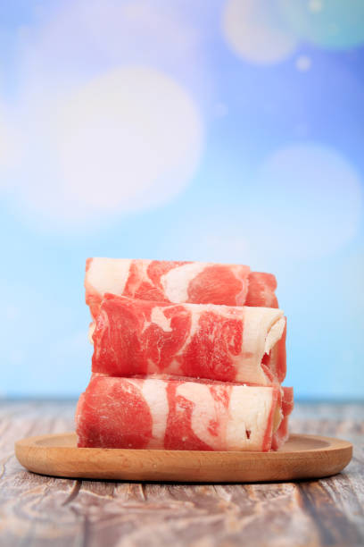 fresh mutton for hot pot, chinese food, Fresh mutton was rolled up on a plate Mutton rolls, fresh mutton for hot pot, chinese food, Fresh mutton was rolled up on a plate mutton roll for chinese hot pot stock pictures, royalty-free photos & images