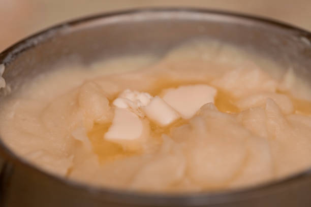 istock Mashed potatoes with butter in a saucepan. Food. Selective focus. Cooking food. 1295952164