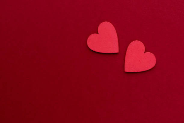 istock Valentine's Day background with red hearts 1295952339