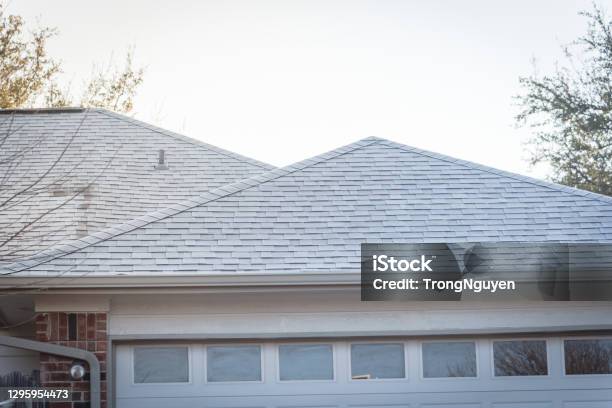 Icy Roof Shingles In Early Winter Morning At Suburban Residential House In Coppell Texas Usa Stock Photo - Download Image Now