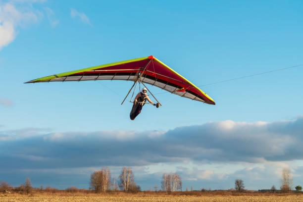 istock Brave girl student is mastering hang gliding sport. 1295954504