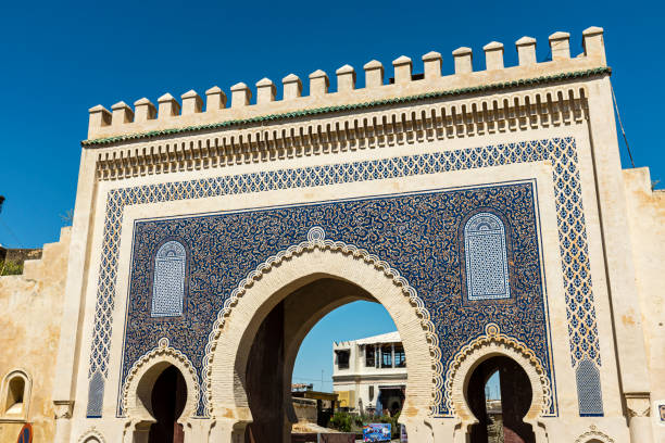 Bab Bou Jeloud, Fez Fes, Morocco - January 8, 2013: Bab Bou Jeloud - an ornamental gate and entrance to the Medina of Fez in Morocco bab boujeloud stock pictures, royalty-free photos & images