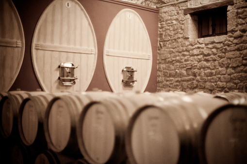 transparent sherry wine barrel in an old cellar in Jerez (Spain) to see the making of sherry wine. These barrels (sherry wine) are used after to aged scotch whiskey