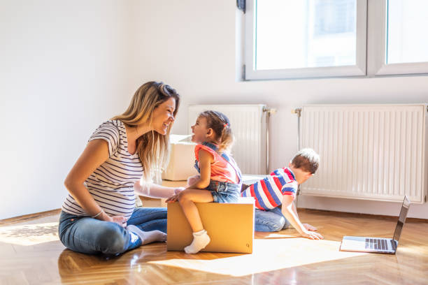 istock Family moving into new home 1295961629
