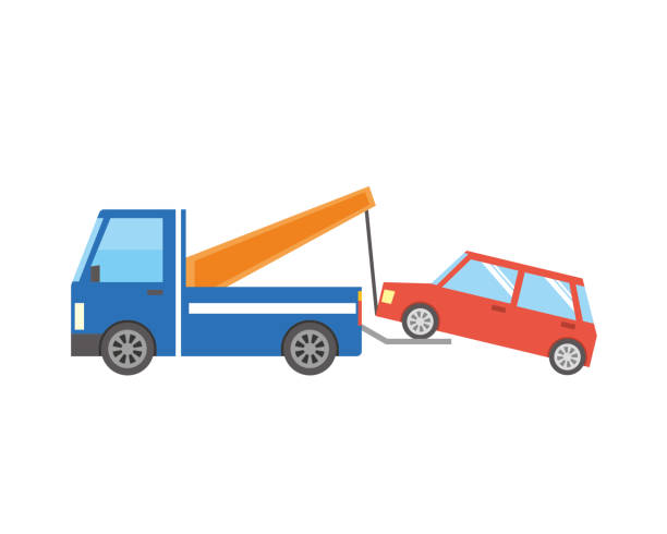 istock Image of a car carried by a tow truck 1295962517