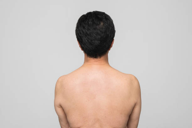 istock Rear view of mature man 1295962923