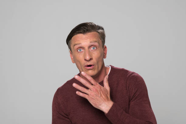 istock Portrait of surprised man 1295962925