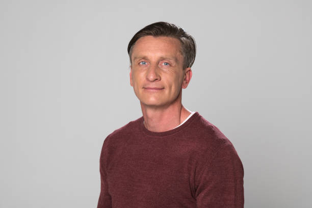 istock Close-up of smiling mature man 1295963226