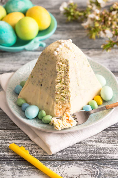 istock Traditional Easter Ortodox curd cake with pistachios. Traditional Easter cottage cheese dessert. Easter background. 1295964370