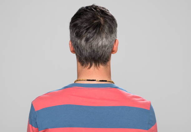 istock Rear view of mature man 1295965698