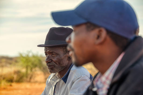 istock African old man with a hat in a village in  Botswana 1295965952