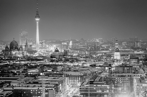 Hamburg, Germany - March 06, 2023: Black and white panorama view of downtown Hamburg with Speicherstadt and St. Catherine's Church, horizontal format