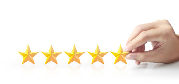 istock Five stars in hand. Increase rating evaluation 1295969917