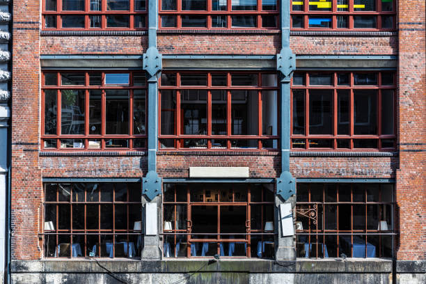Old classic converted warehouse next to a canal into restaurant in Neustadt, Hamburg, Germany