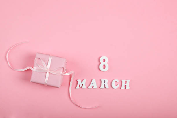 istock beautiful background for March 8 on a colored background with place for text. International Women's Day 1295978643