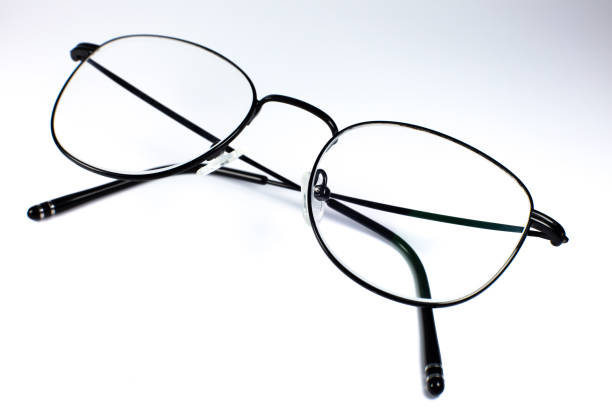 istock Black frame glasses on a white background. Close up photo. 1295981483