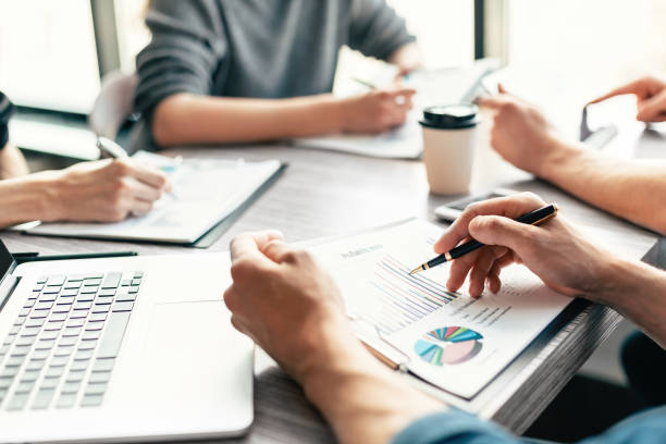 istock close up. image of financial documents on the office Desk 1295983171