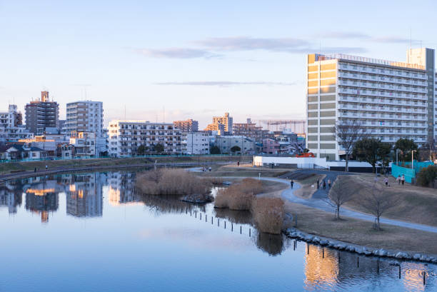 istock Urban residential area in Japan, riverside scenery 1295985537
