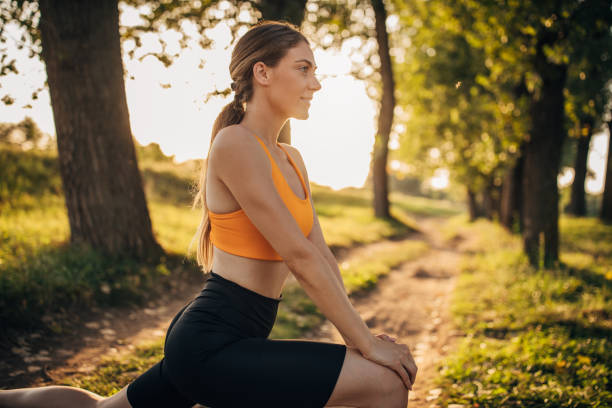 istock Fit woman exercising in nature 1295985570