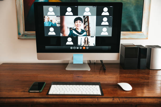 istock Live streaming video conference. Woman hosting a call waiting for Users attendance 1295988072