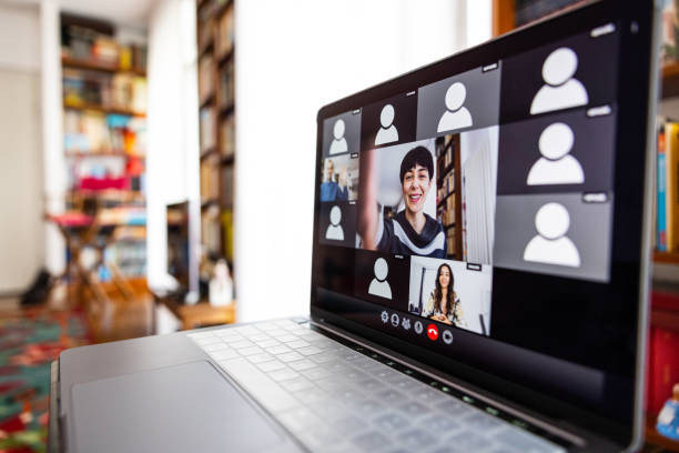 istock Live streaming video conference. Woman hosting a call waiting for Users attendance 1295988119