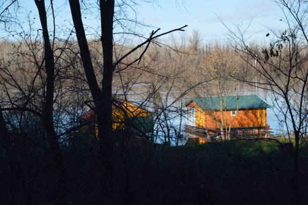 istock a house on a raft on the river 1295988474