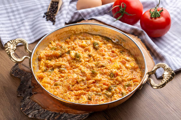 istock Traditional turkish food (Turkish name; menemen) made by eggs and tomatoes. 1295989836