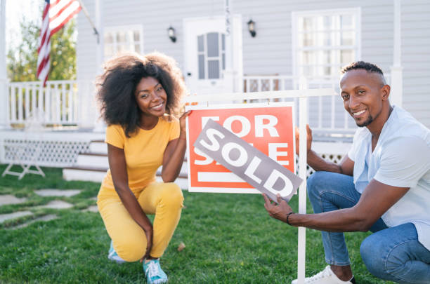istock Young afro couple buying a new house 1295989985