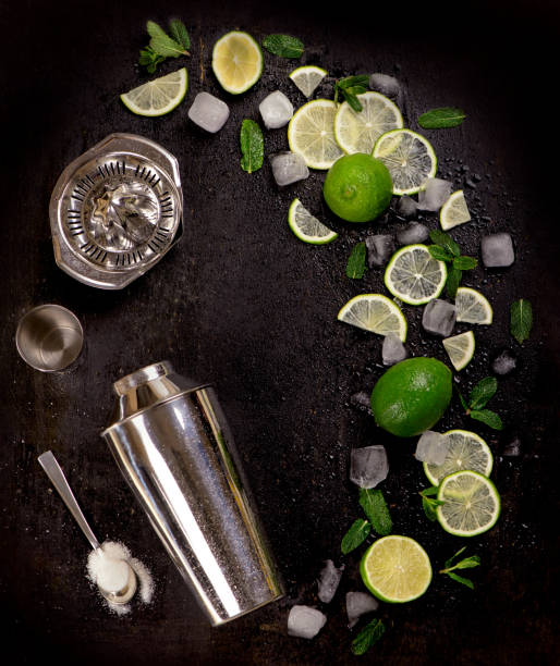 istock Bar accessories and ingredients for cocktail drink lime, mint, ice 1295990786