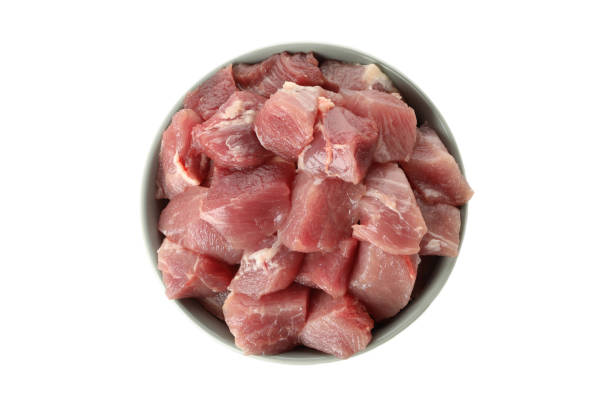 istock Bowl with raw meat isolated on white background 1295990827