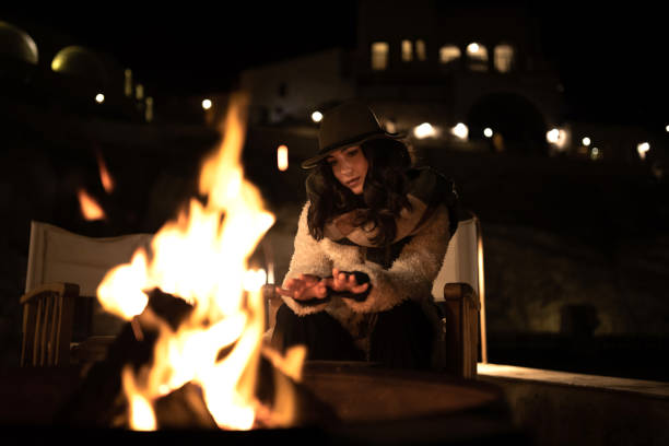 istock Sitting By The Fire At Night 1295990869