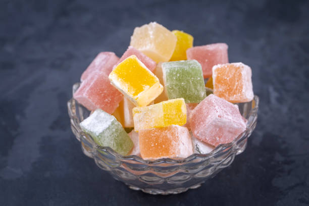 istock Traditional delicious Turkish delight on the black background 1295991019
