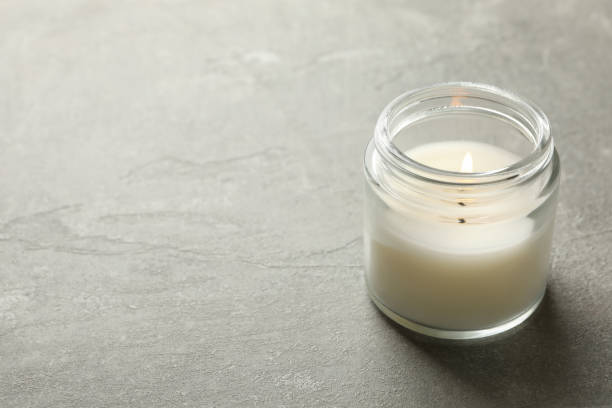 istock Scented candle for relax on gray background 1295991851