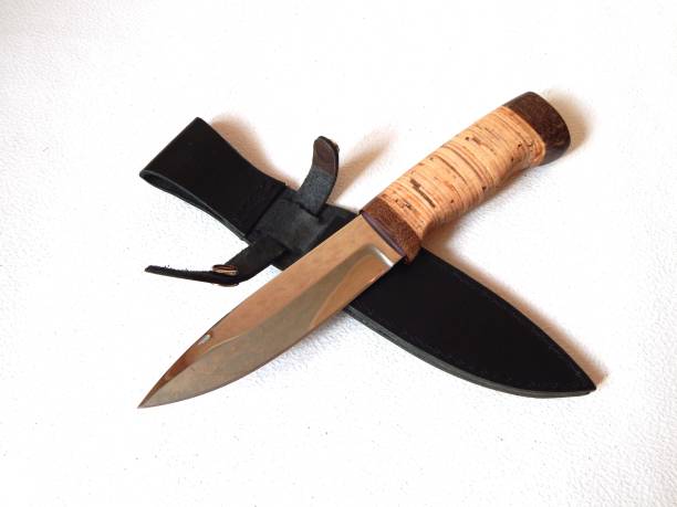 istock Hunting knife with birch bark handle. Handmade knife and leather sheath. 1295992093