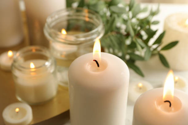 istock Burning scented candles for relax, close up 1295992217