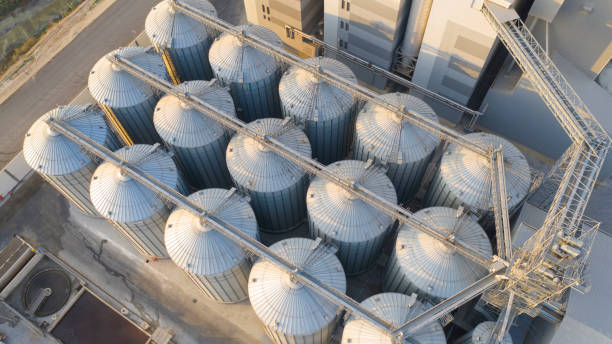 istock Aerial view of agricultural silos. 1295993570
